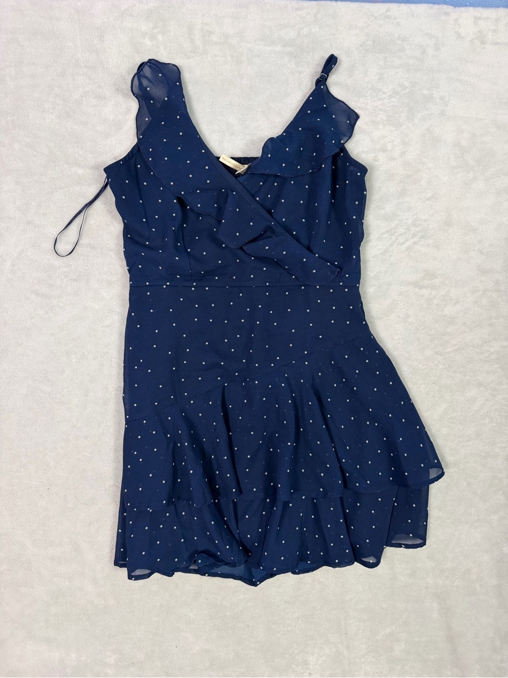 Women’s  romper - likely Shorts or Skorts